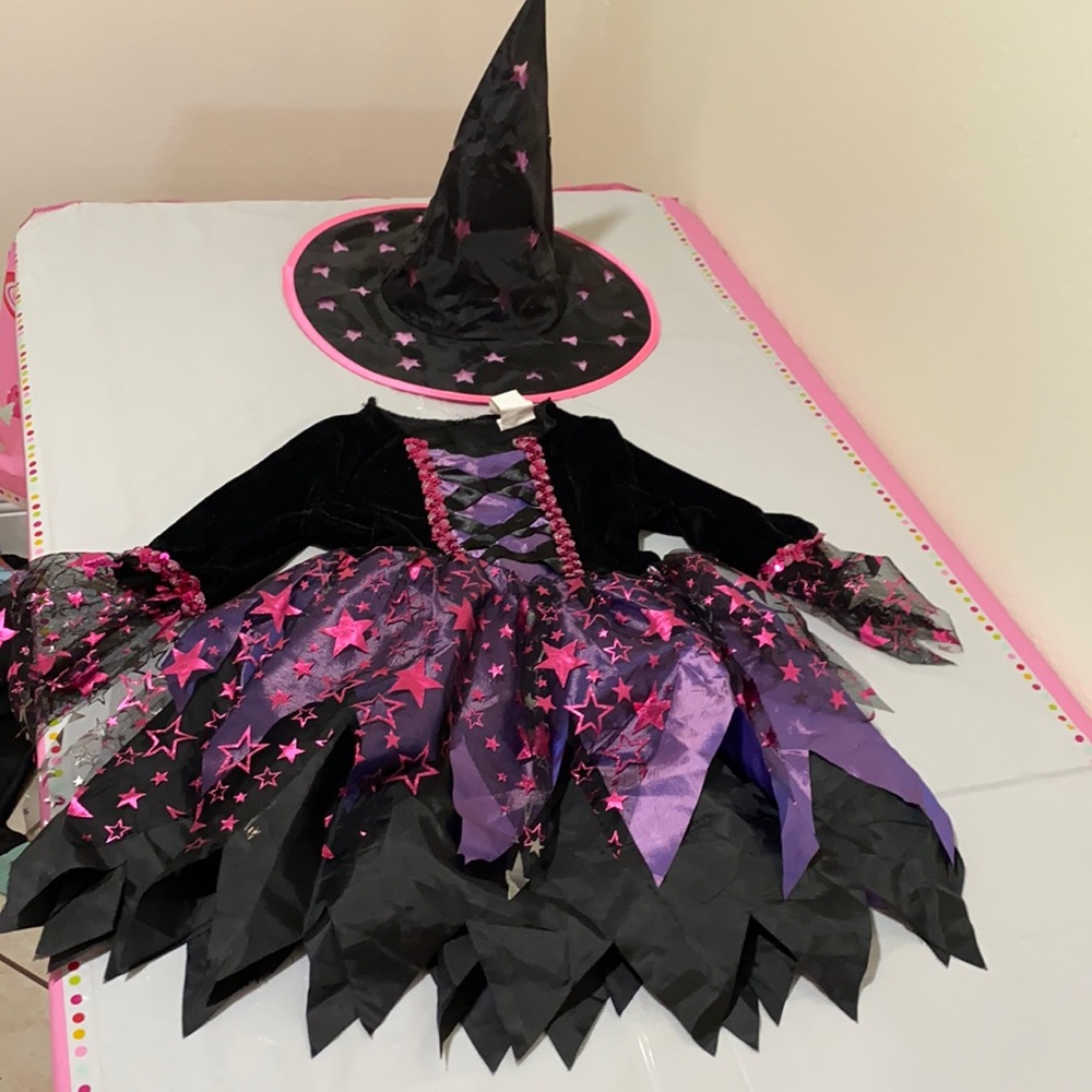 Gently used once witch Halloween costume with hat size 5